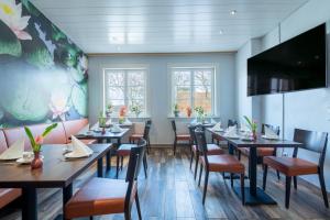 En restaurang eller annat matställe på Hotel Seerose Lindau Bodensee