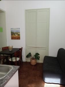 A seating area at Il gallo di Eracle - Charming suites & rooms