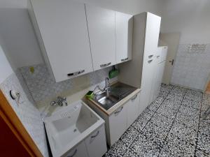 Kuchyňa alebo kuchynka v ubytovaní Casa Gilè