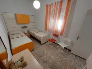 Posteľ alebo postele v izbe v ubytovaní Casa Gilè