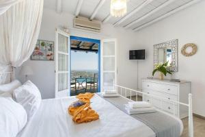 Giường trong phòng chung tại Seaview Villa Giovanna - Premium Location&Jacuzzi