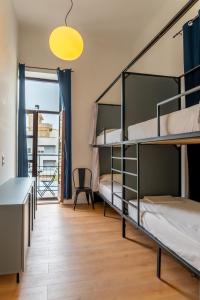 Postel nebo postele na pokoji v ubytování Intra Muros Hostel + 37 fotografií