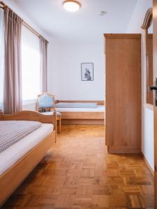 Postel nebo postele na pokoji v ubytování Landhaus Weber
