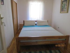 Ένα ή περισσότερα κρεβάτια σε δωμάτιο στο Zora Holiday home