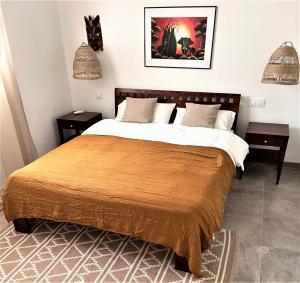 Postel nebo postele na pokoji v ubytování Casa Bellavista Tenerife