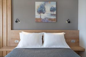 Sarah Luxury Rooms客房内的一张或多张床位