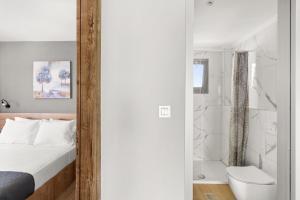 Sarah Luxury Rooms客房内的一张或多张床位