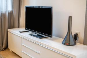 A television and/or entertainment centre at Plose 35