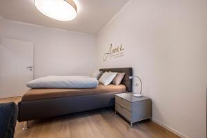 A bed or beds in a room at Plose 35