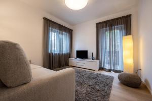 A television and/or entertainment centre at Plose 35