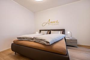 A bed or beds in a room at Plose 35