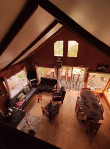 an overhead view of a living room with furniture at Quemchi Cabaña in Quemchi