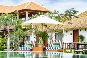 Bazén v ubytování RiverTree Villa & Resort nebo v jeho okolí