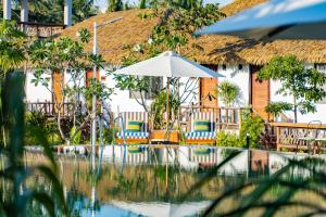 Bazén v ubytování RiverTree Villa & Resort nebo v jeho okolí