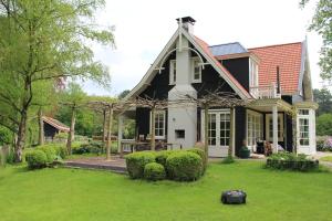 Photo de la galerie de l'établissement Huize Koempoelan, à Naarden