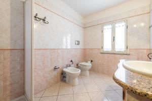 Kúpeľňa v ubytovaní Appartamento in Villa Gelsomino