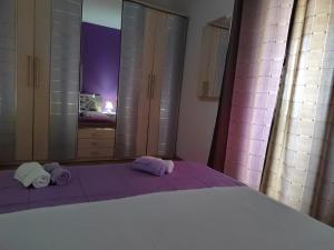 Postel nebo postele na pokoji v ubytování Apartman Memories