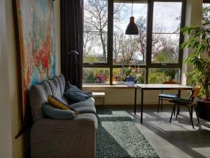 Posezení v ubytování LOGEMENT DE SCHOOL Middelburg + 25 fotografií