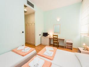 Ένα ή περισσότερα κρεβάτια σε δωμάτιο στο Guesthouse Aurora