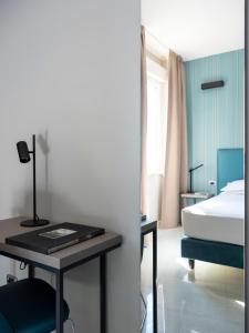 Postel nebo postele na pokoji v ubytování Allegroitalia La Spezia 5 Terre