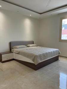 أفخم شقة فندقيه بالقرب من الحرم المكي tesisinde bir odada yatak veya yataklar
