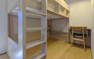 Palanda nebo palandy na pokoji v ubytování OMISHIMA SPACE Omoya