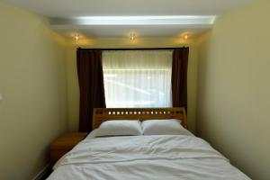 Postel nebo postele na pokoji v ubytování Villa Luxury Rooms - Wine Resort