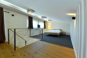 Postel nebo postele na pokoji v ubytování Villa Luxury Rooms - Wine Resort