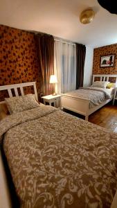 Postel nebo postele na pokoji v ubytování Honey house Lika
