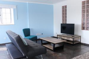 TV a/nebo společenská místnost v ubytování Casa do Largo - Casa Sotto