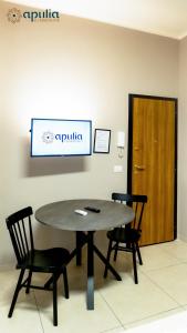 TV a/nebo společenská místnost v ubytování Dante 3 Guesthouse by Apulia Accommodation