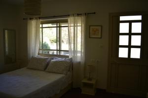 Cama o camas de una habitación en Rothschild Galilee Hospitality
