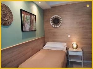 A bed or beds in a room at Habitaciones Barra89