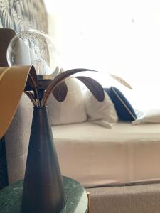 Katil atau katil-katil dalam bilik di Design Apartment Catch Me If You Can