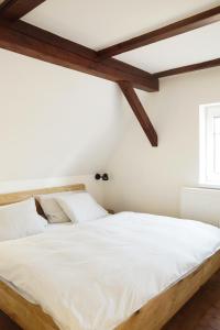 Postel nebo postele na pokoji v ubytování Apartmány Winkler