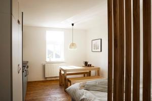 Postel nebo postele na pokoji v ubytování Apartmány Winkler