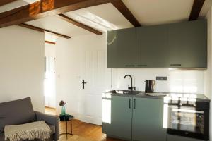 Kuchyň nebo kuchyňský kout v ubytování Apartmány Winkler