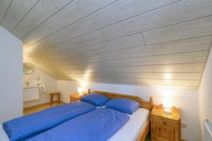 Katil atau katil-katil dalam bilik di Waldfee mit eigener Sauna