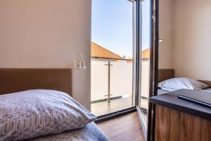 Posteľ alebo postele v izbe v ubytovaní NoclegiJarocin Bed & Breakfast