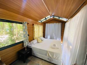 Postel nebo postele na pokoji v ubytování Calala Lodge
