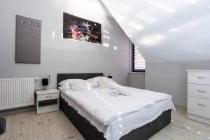 Posteľ alebo postele v izbe v ubytovaní NoclegiJarocin Bed & Breakfast