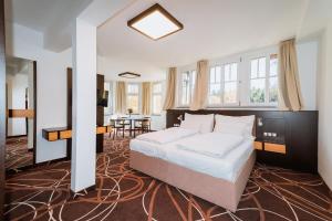 Posteľ alebo postele v izbe v ubytovaní Hotel Hubertus