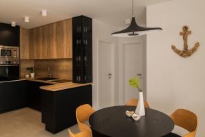 Kuchyňa alebo kuchynka v ubytovaní Villa Magna luxury apartments
