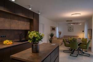 Posedenie v ubytovaní Villa Magna luxury apartments