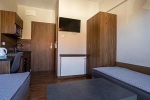 Posteľ alebo postele v izbe v ubytovaní NoclegiJarocin Bed & Breakfast