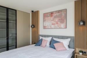 Posteľ alebo postele v izbe v ubytovaní Villa Magna luxury apartments