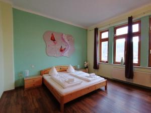 Postel nebo postele na pokoji v ubytování Pension Bomätscher