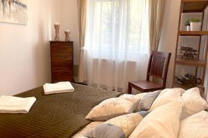 Posteľ alebo postele v izbe v ubytovaní Full 2BDR Garden House near to Downtown Metro Free Parking