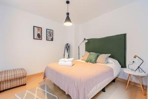 Posteľ alebo postele v izbe v ubytovaní Green-Apartments Buenaventura Deluxe con Terraza Privada