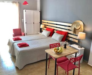 Postel nebo postele na pokoji v ubytování Eleana Apartments